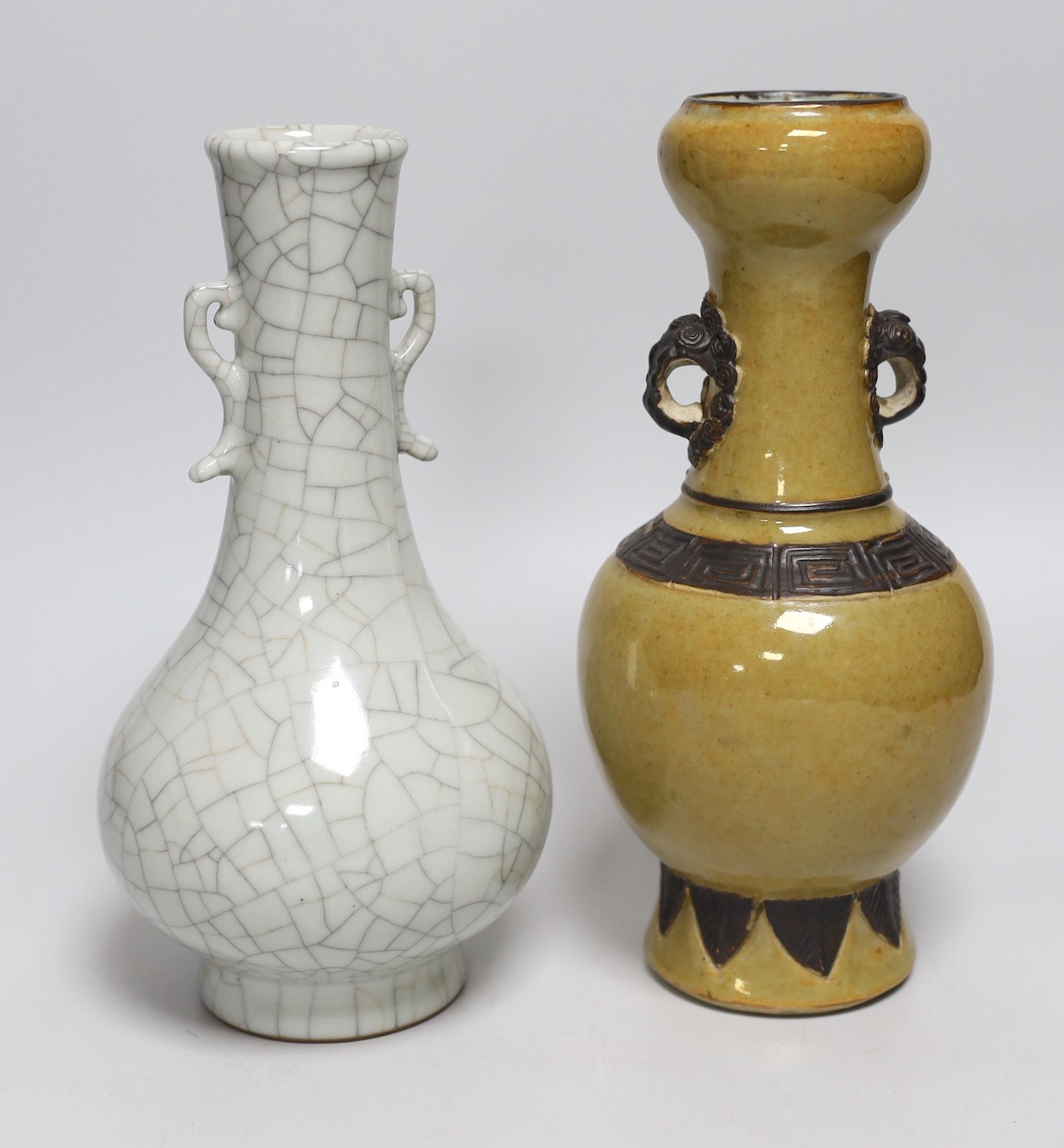 A Chinese crackle glaze vase, 24cms high and a pale brown glazed vase